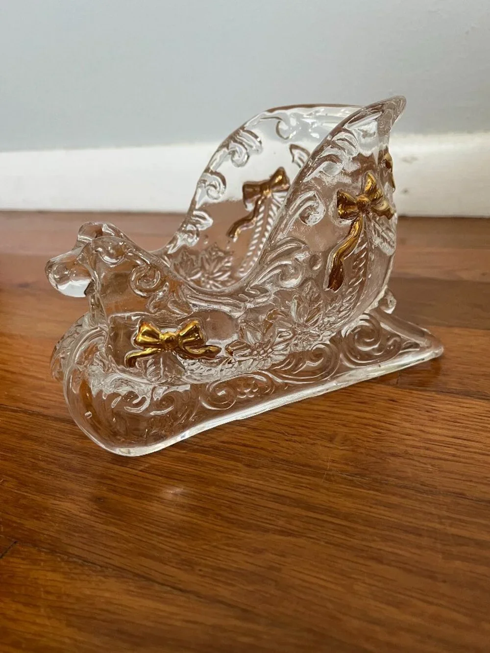 Glass sleigh with decorative gold-painted bows | Vintage